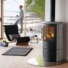 HWAM 3640c черного цвета с облицовкой из мыльного камня
